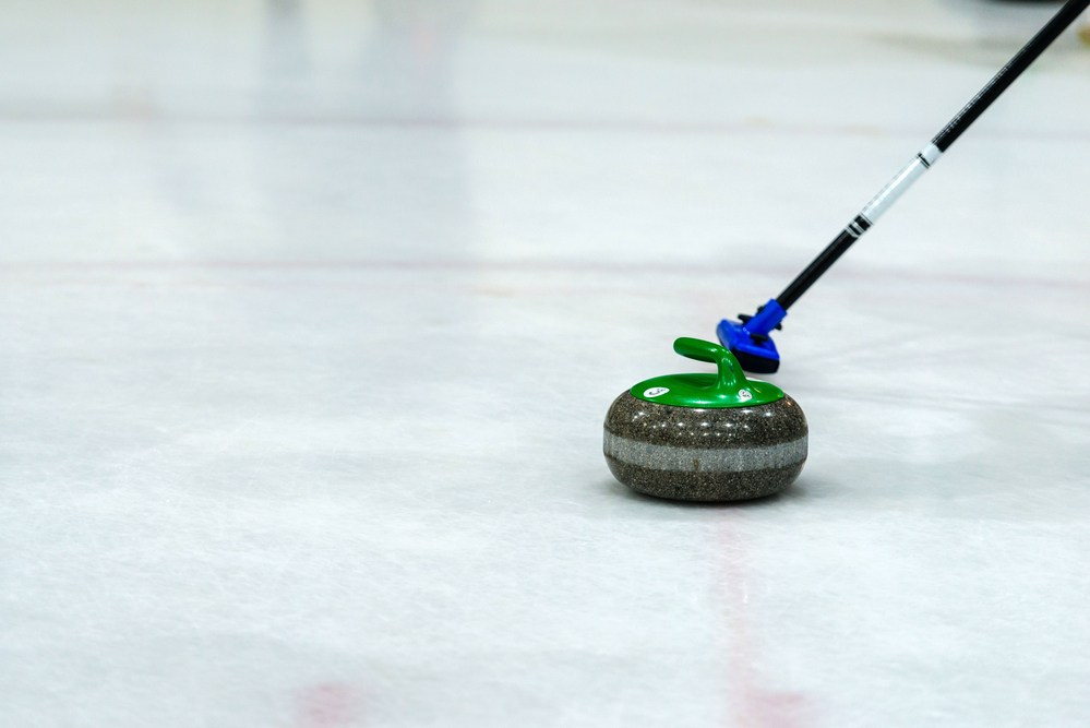 Does sweeping in curling slow it down?