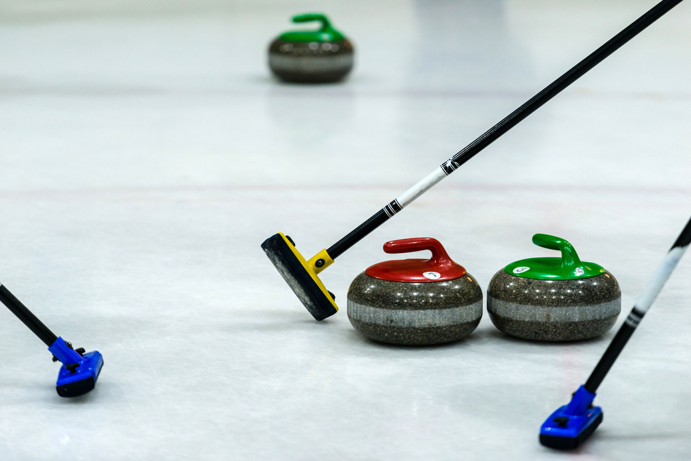 What is a curling broom made of?